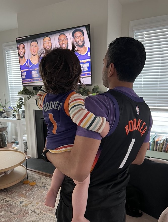 Watching the Suns in matching Booker jerseys